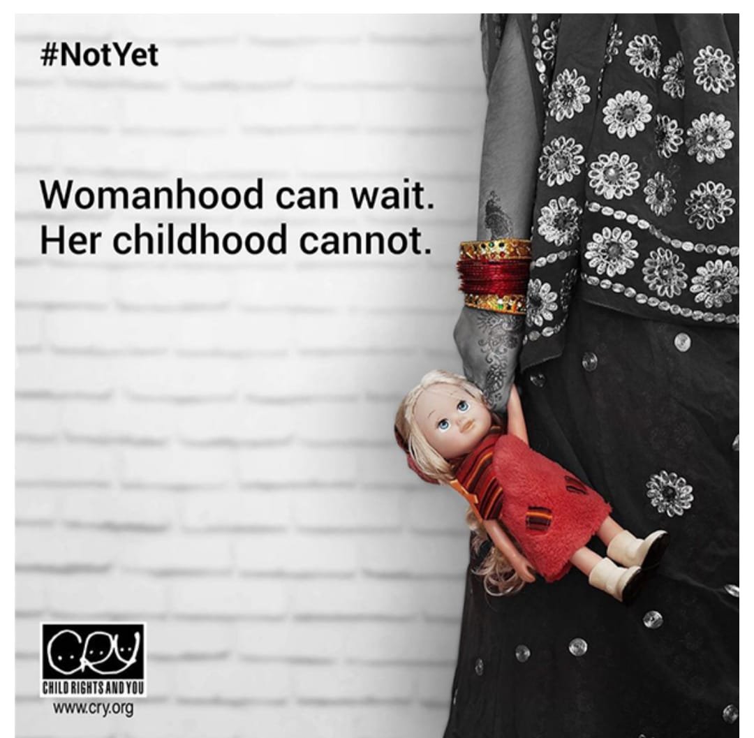 CRY #NotYet campaign - Holding doll
